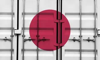 Container mit japanischer Flagge als Symbol für Japans Handelshäuser, die Buffett ins Visier genommen hat
